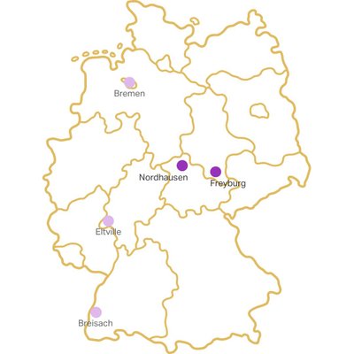 Ausbildungsstandorte: Eine schematische Karte Deutschlands mit hervorgehobenen Städten wie Bremen, Nordhausen und Freiburg in lila Punkten.