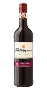 Eine Flasche Rotwein mit dem Etikett 'Rotkäppchen' und der Bezeichnung 'Dornfelder Halbtrocken' steht aufrecht.