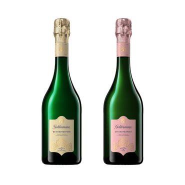 Elegante Sektflaschen mit goldenen und rosafarbenen Korken, die die Vielfalt der Geldermann-Weine repräsentieren, stehen nebeneinander.