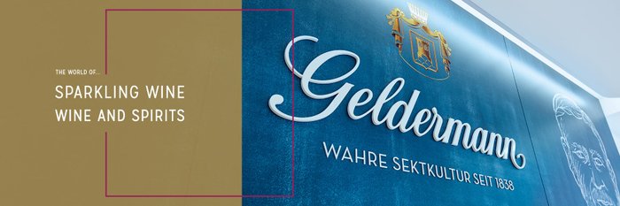 A stylish Geldermann logo on a blue wall with golden accents