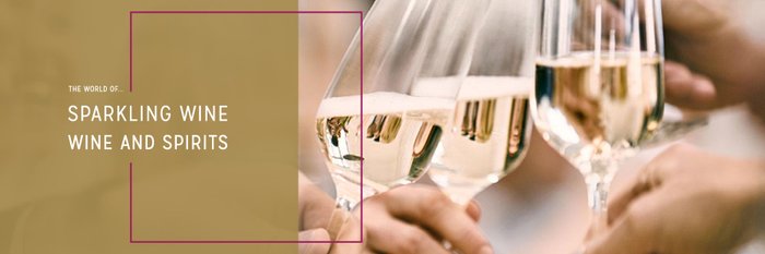 Hands hold glasses of sparkling wine to celebrate a festive toast.