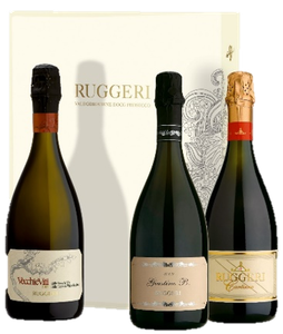 Three bottles of Prosecco from Ruggeri stand in front of elegant packaging that displays the brand name in gold letters.