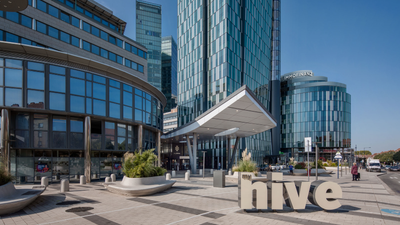 Vienna: Modern architecture characterizes the facade of the building, while the lettering 'hive' stands out in the foreground.