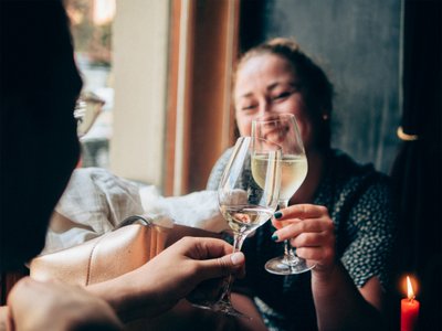 Smiling faces toasting a special occasion