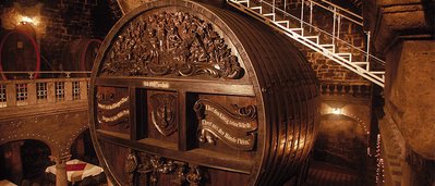 Historic wine cellars with impressive wooden barrels