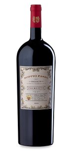 A large bottle of red wine with an elegant label displaying the name 'Doppio Passo' and the 2016 vintage.