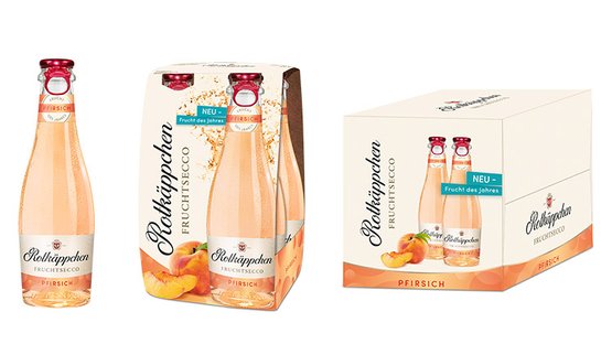 Die Flasche und die Box von Rotkäppchen Fruchtsecco zeigen ein fruchtiges Pfirsichthema, ideal für Sommerfeiern.