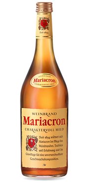 Eine stilvolle Flasche Mariacron Weinbrand, die in sanftem Licht glänzt und die feine Qualität des Inhalts betont.